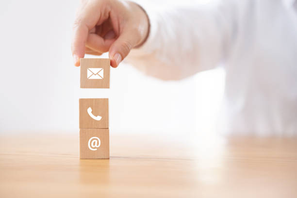 istock CONTACT US, Businessman hand holding ( mail,phone,email ) icon. cutomer support concept. 1339077882