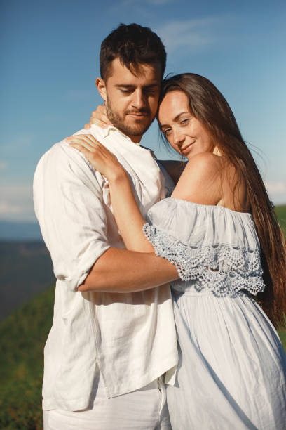 istock Couple walk in the mountains 1339078116