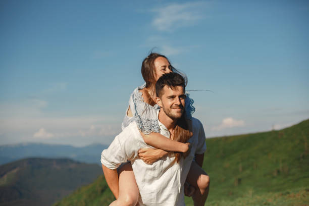 istock Couple walk in the mountains 1339078118