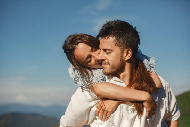 istock Couple walk in the mountains 1339078125