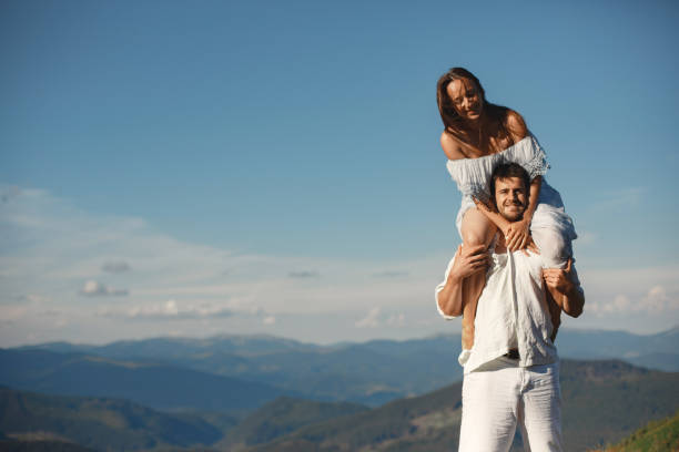 istock Couple walk in the mountains 1339078133