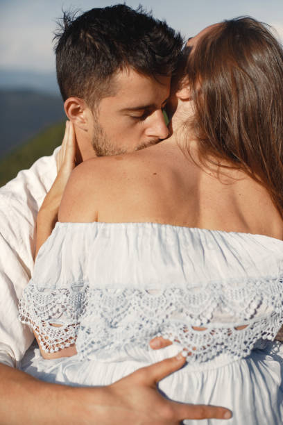 istock Couple walk in the mountains 1339078192
