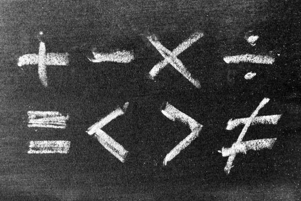 istock Set of math symbol draw by chalk on black board background 1339078653