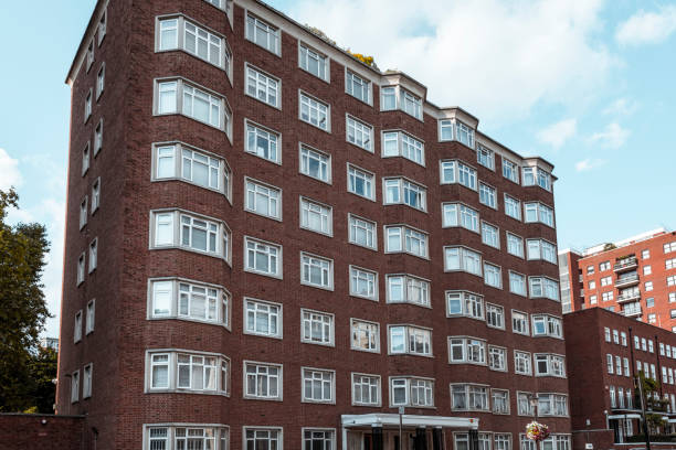 Low angle view of Art Deco block of apartments in London in a sunny day.