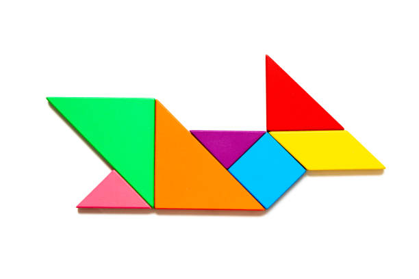 istock Color tangram puzzle in whale, fish or shark shape on white background 1339079427
