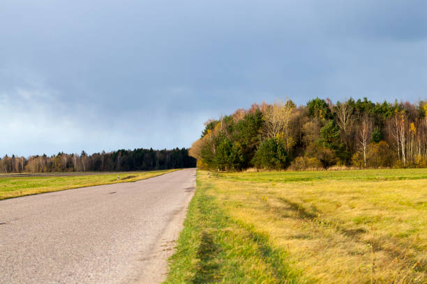 istock a quiet road in the autumn season 1339084687