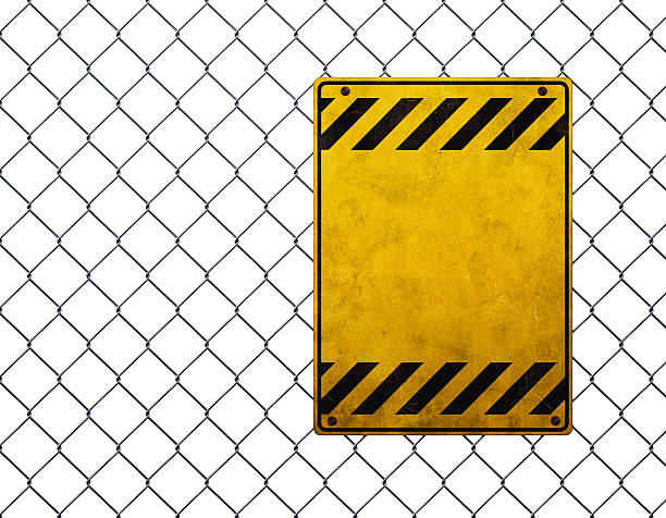 Empty yellow warning sign at chainlink fence Illustration of a chainlink fence with yellow striped plate on it rusty fence stock pictures, royalty-free photos & images