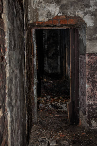 istock door inside dirty and dark abandoned building 1339086489