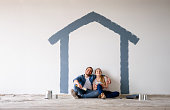 Couple painting their house and daydreaming about how itâs going to look