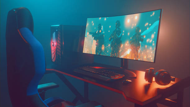 istock Desktop pc in a gamer room shows a violent video game with soldiers 1339094105