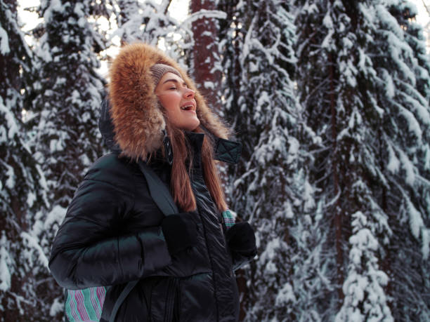istock Winter walk through the forest, snow-covered beautiful pine forest. 1339095311