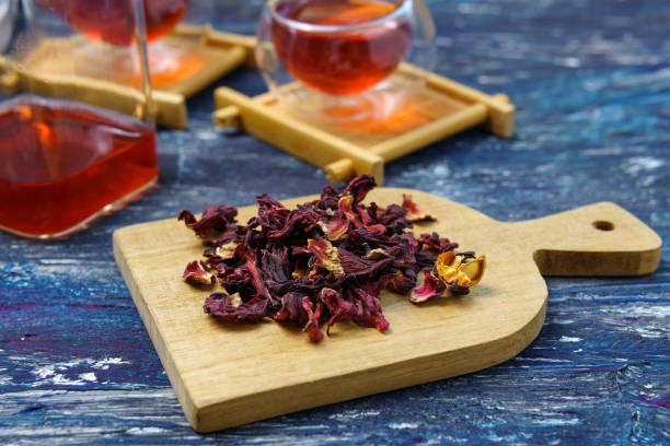 istock Hibiscus tea is fresh tea. Vitamin tea for colds and flu. On a dark background 1339100177