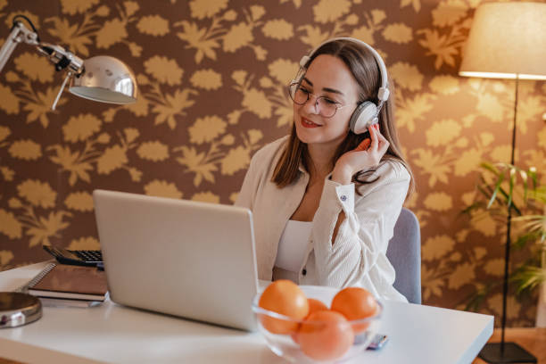 istock E-learning for young woman at home 1339104048