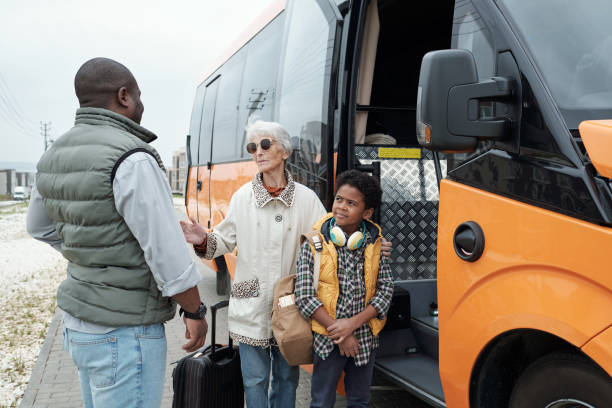 istock Putting Grandma and Son on Bus 1339106342