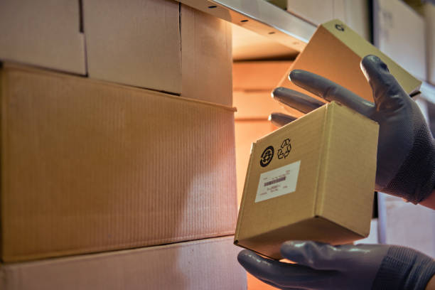 istock Falling and damage to packaging and goods in parcels in the warehouse. Problems with the safety of cargo during postal delivery 1339109453