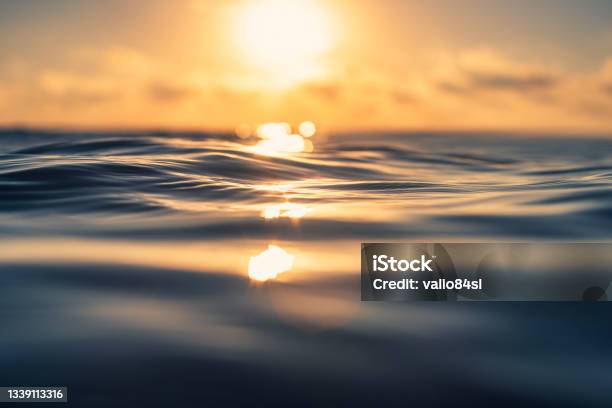 Sea Wave Close Up Low Angle View Sunrsie Shot Stock Photo - Download Image Now - Sea, Water, Sunrise - Dawn