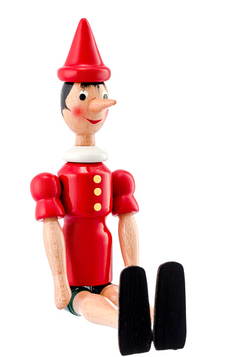 Pinocchio Toy Statue isolated on white background