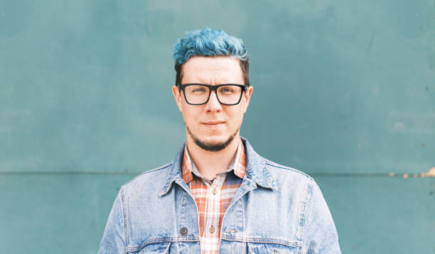 istock Portrait young man with blue hairstyle. 1339114415