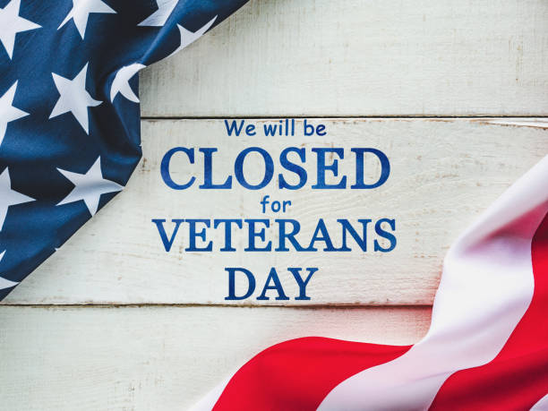 istock Veterans Day. American Flag lying on the table 1339117844
