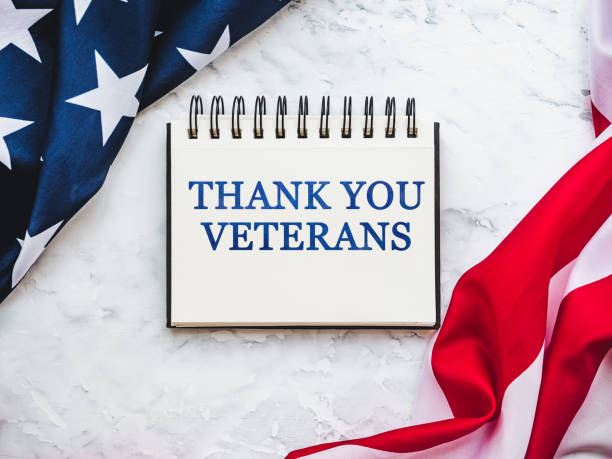 istock Veterans Day. American Flag lying on the table 1339117930