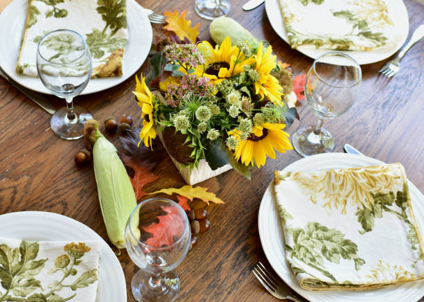istock Fall autumn thanksgiving table setting for celebratory festive family dinner. 1339121162