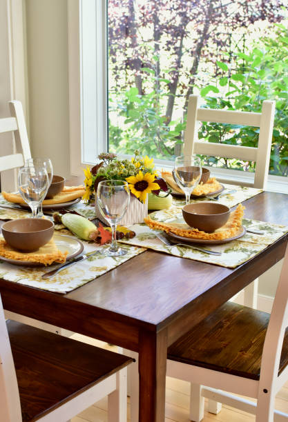 istock Fall autumn thanksgiving table setting for celebratory festive family dinner. 1339121198