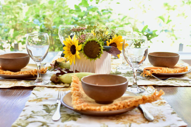istock Fall autumn thanksgiving table setting for celebratory festive family dinner. 1339121203
