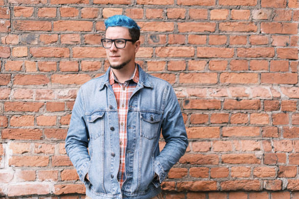istock Stylish young man with blue hair. 1339122090