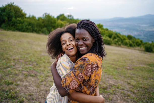 istock Lovely mother embracing her cute daughter 1339126587