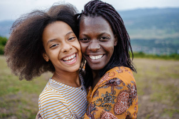 istock Lovely mother embracing her cute daughter 1339126845