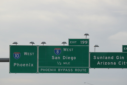 Sign to Phoenix Driving west on Interstate 10 in Arizona.