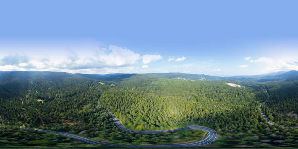 360 degrees spherical panoramic aerial view of beautiful mountains covered with green forest