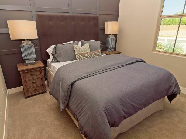 istock Guest Bedroom With Tall Head Board 1339132690