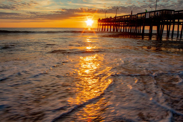 istock Sunrise at the Sandbridge pier 1339138263