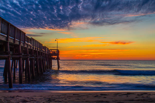 istock Sunrise at the Sandbridge pier 1339138603