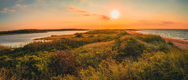 Coastal summer morning landscape over the South Cape Beach in Mashpee, Massachusetts.