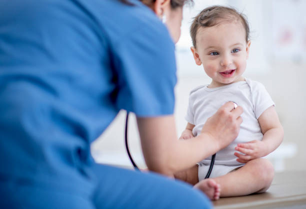 istock Cute Caucasian baby at a medical check up 1339155653