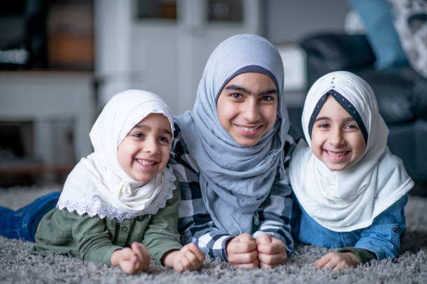 istock Three (3) Muslim sisters happy and smiling 1339156011