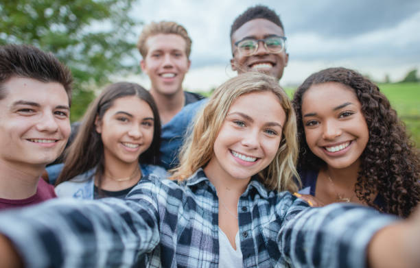 istock Multi ethnic group of teenagers taking a selfie 1339161070