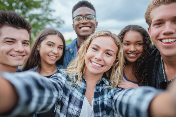 istock Multi ethnic group of teenagers taking a self portrait 1339161071