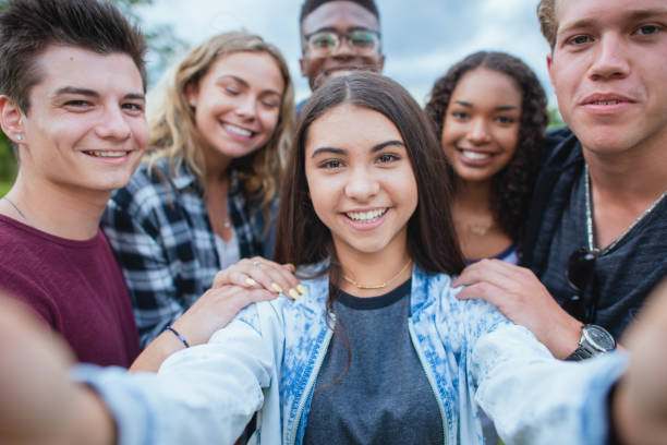 istock Teenagers taking a group selfie 1339161075
