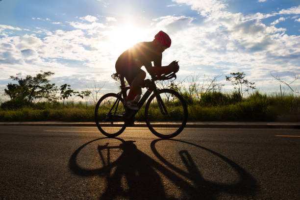 istock Senior cyclist training with time trial bike 1339163223