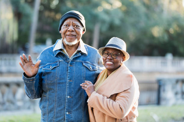 istock Senior African-American couple, smiling at camera 1339170411
