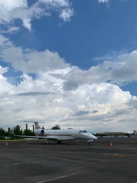 istock White private jet parking at airport 1339172260