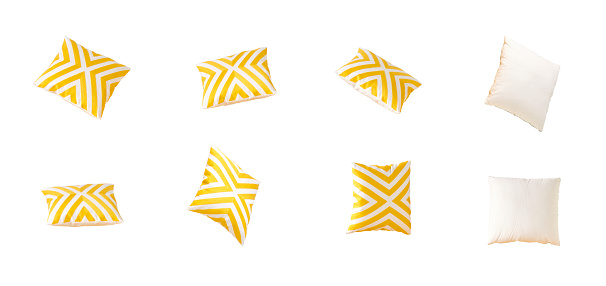 Different angle square yellow pillow isolated on white background