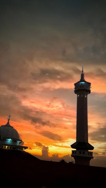 istock twilight silhouette view of the mosque with its minaret 1339185918