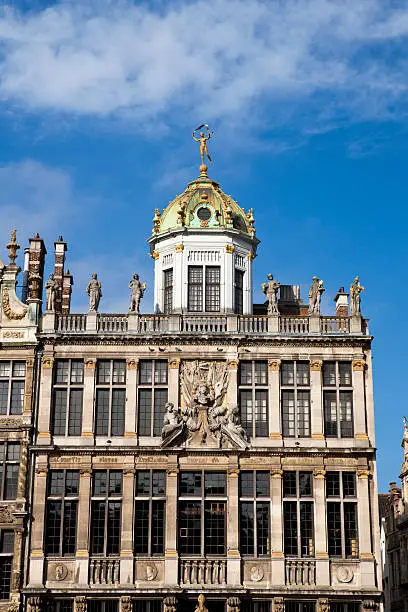 One of the ornate guildhouses in the Grand Place in Brussels, Belgium.  This is the Maison des Boulangers, or the Baker's Guildhouse.