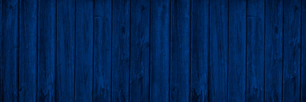 istock Dark blue wood background with copy space for design. Wide banner. 1339187064