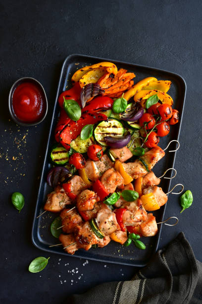 Chicken skewers kebab with grilled vegetables