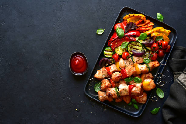 Chicken skewers kebab with grilled vegetables